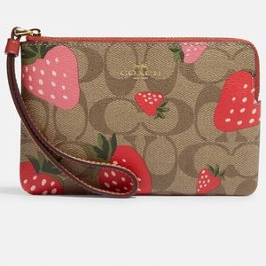 RARE LIMITED EDITION Coach wild strawberry wristlet. BRAND NEW. RARE!